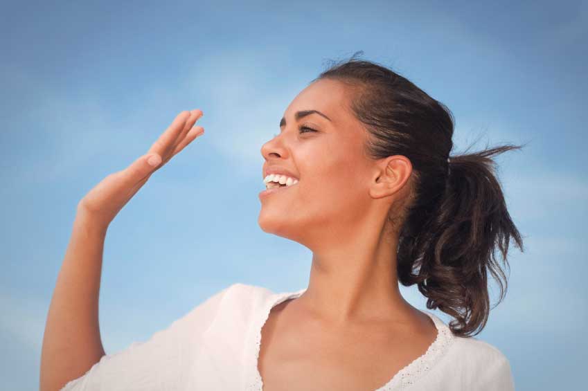 Woman waving goodbye.